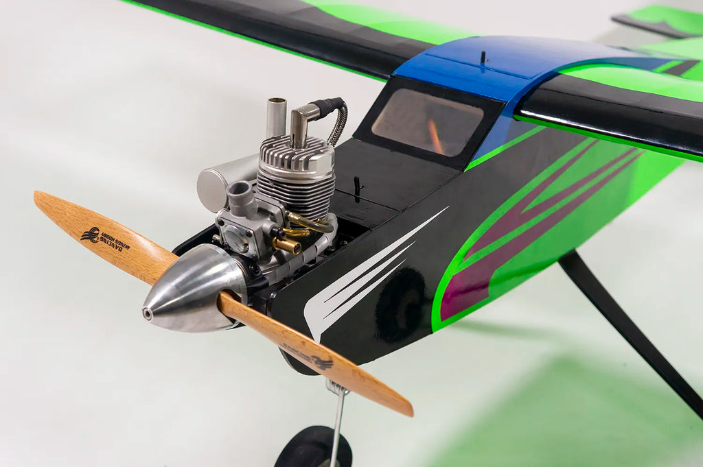 Model airplane with engine and propeller on a white background