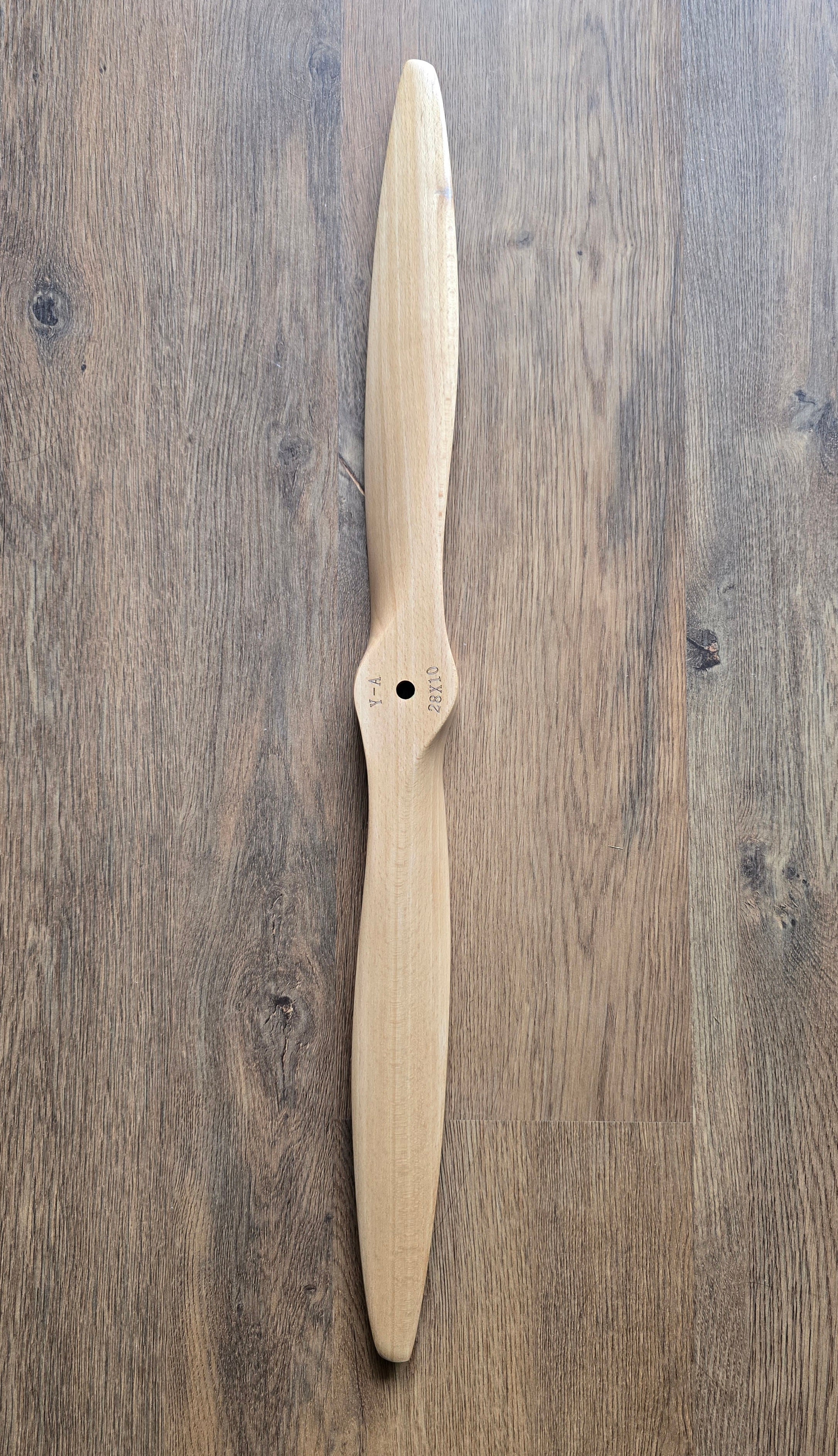 Wooden propeller on a wooden surface