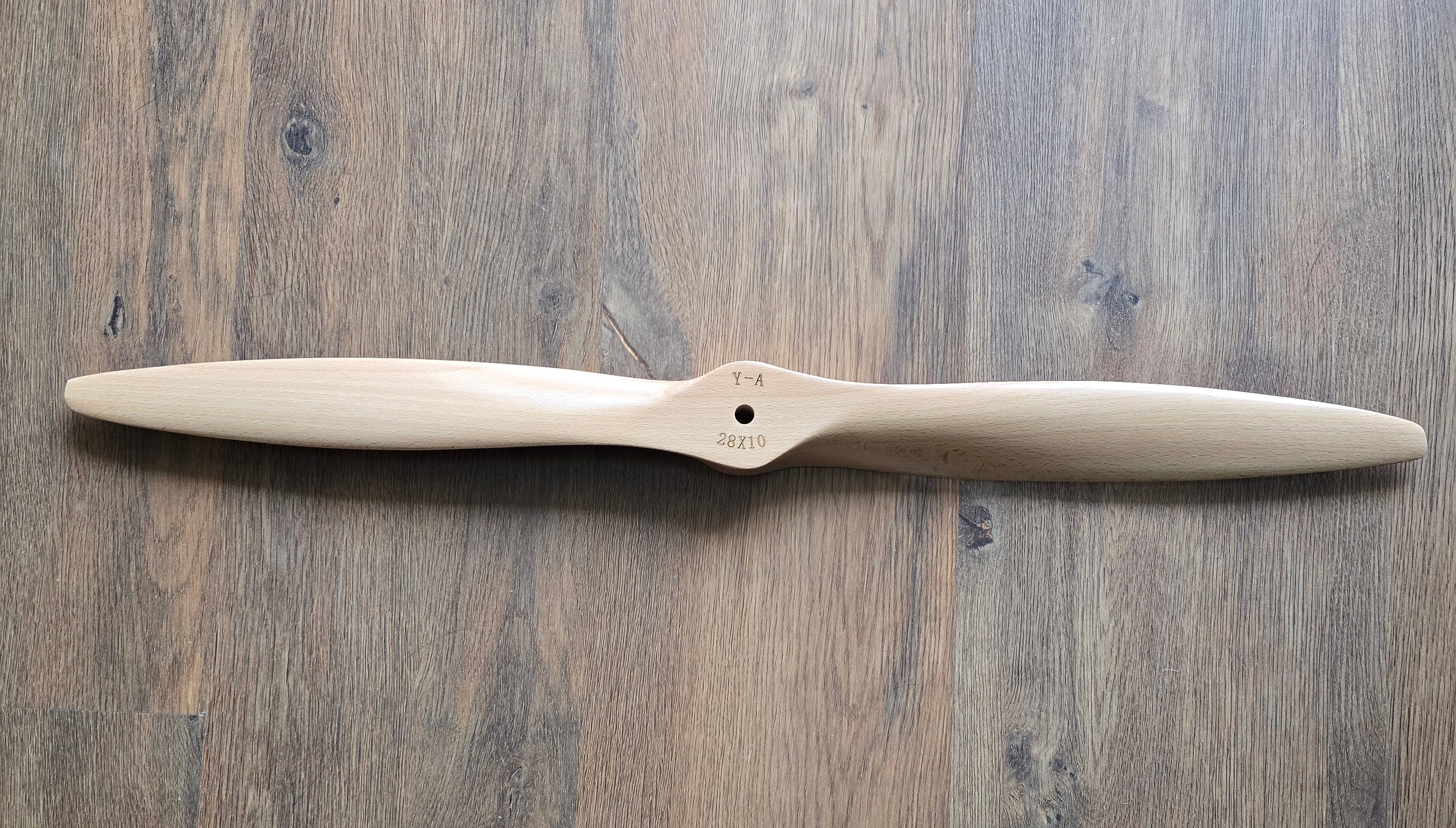 Propeller on a wooden surface