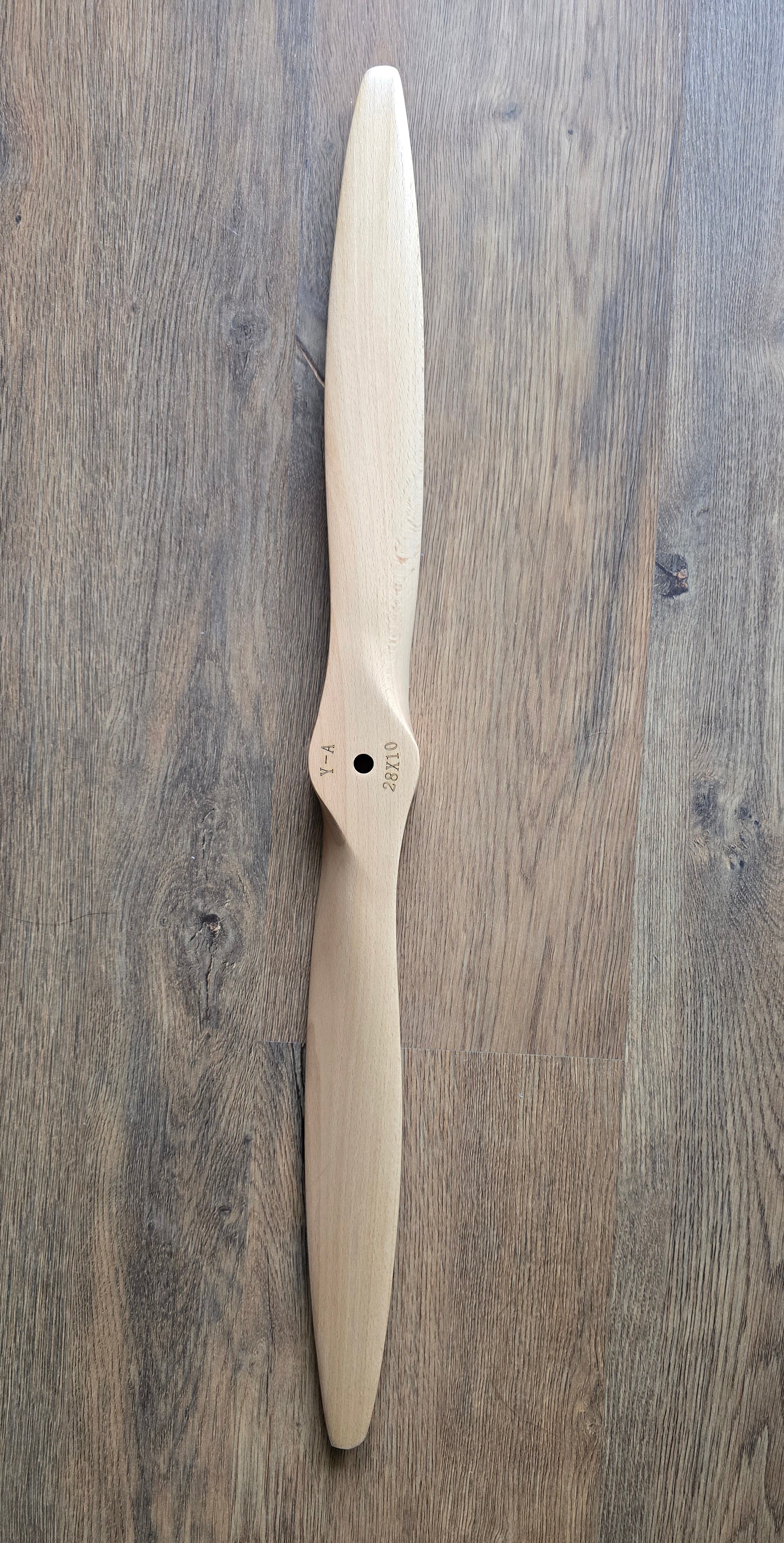 Propeller on a wooden surface