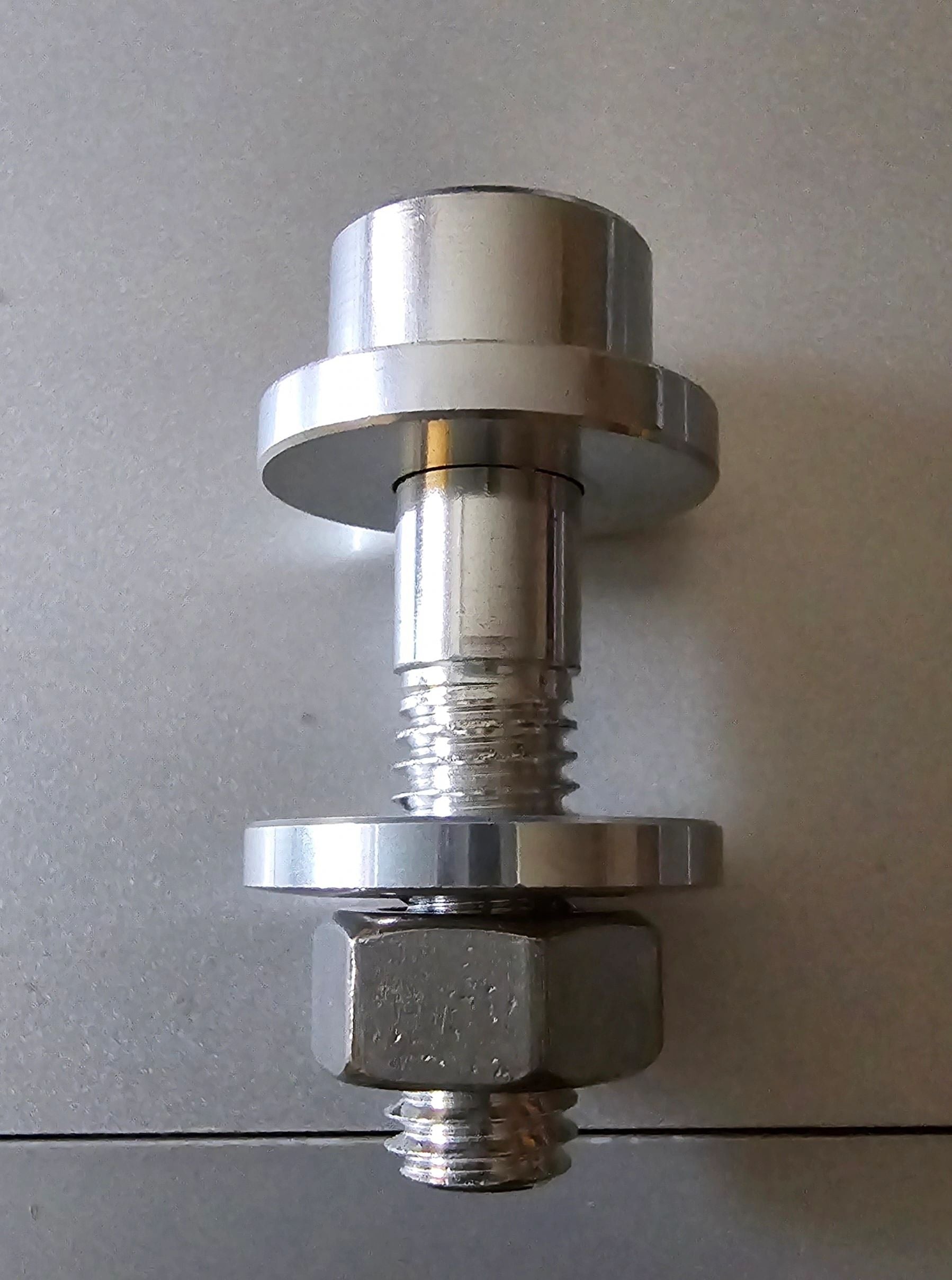 Metallic bolt or similar fastener on a plain background